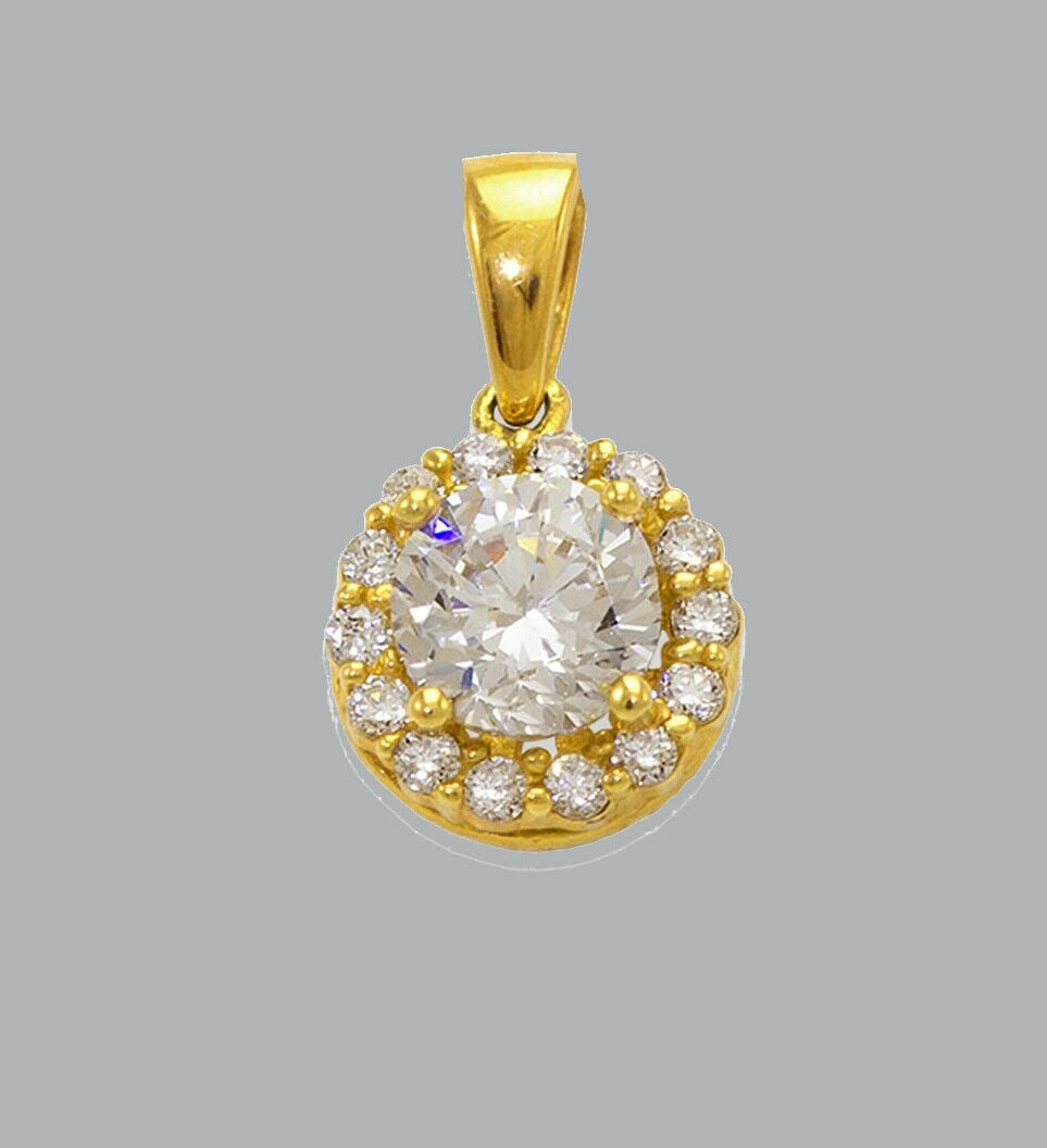 14K YELLOW GOLD CZ CHARM PENDANT HALO ROUND CUT 7.5mm: NEW 14K YELLOW GOLD HALO CZ PENDANT New 14K Yellow Gold pendant Measures 7.5x7.5mm Set with cubic zirconia Polished finish Stamp: 14k Apx Weight: 0.9g