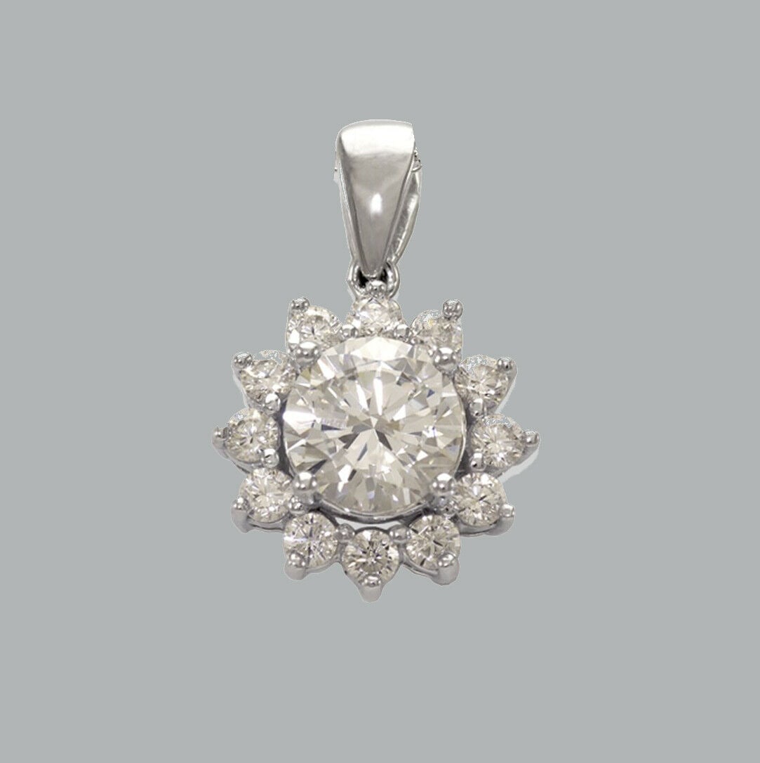 14K WHITE GOLD CZ FANCY CHARM PENDANT FLOWER HALO: NEW 14K WHITE GOLD FLOWER CZ PENDANT New 14K White Gold pendant Measures 10mm Set with cubic zirconia Polished finish Stamp: 14k Apx Weight: 1.2g