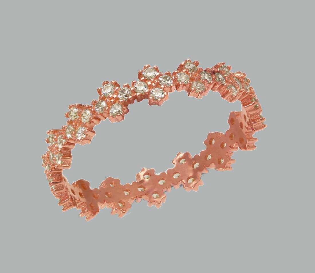 NEW 14K ROSE GOLD FULL ETERNITY CZ BAND RING SIZE 6: NEW 14K ROSE GOLD ETERNITY BAND New 14K rose gold full eternity band ring 4mm Wide Well made rings. prong set with full cut cz. Ring size is 6 Polished finish Apx weight is 1.5g