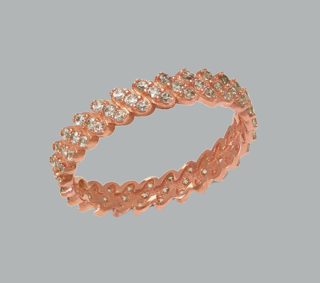 NEW 14K ROSE GOLD FULL ETERNITY CZ BAND RING SIZE 6: NEW 14K ROSE GOLD ETERNITY BAND New 14K rose gold full eternity band ring 3.5mm Wide Well made rings. prong set with full cut cz. Ring size is 6 Polished finish Apx weight is 1.6g