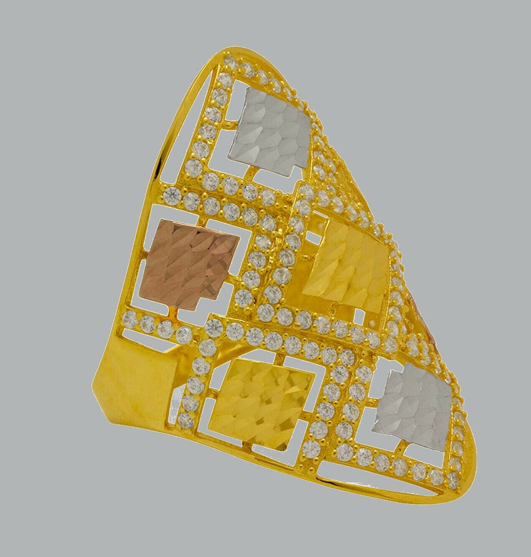 NEW 14K TRI COLOR GOLD LADIES CZ COCKTAIL RING: NEW 14K TRI COLOR GOLD CZ COCKTAIL RING New 14K Tri color solid gold ring Ring size 7 Measures 20mm W x 32mm H Cubic Zirconia Polished Finish Apx Weight: 4.1g