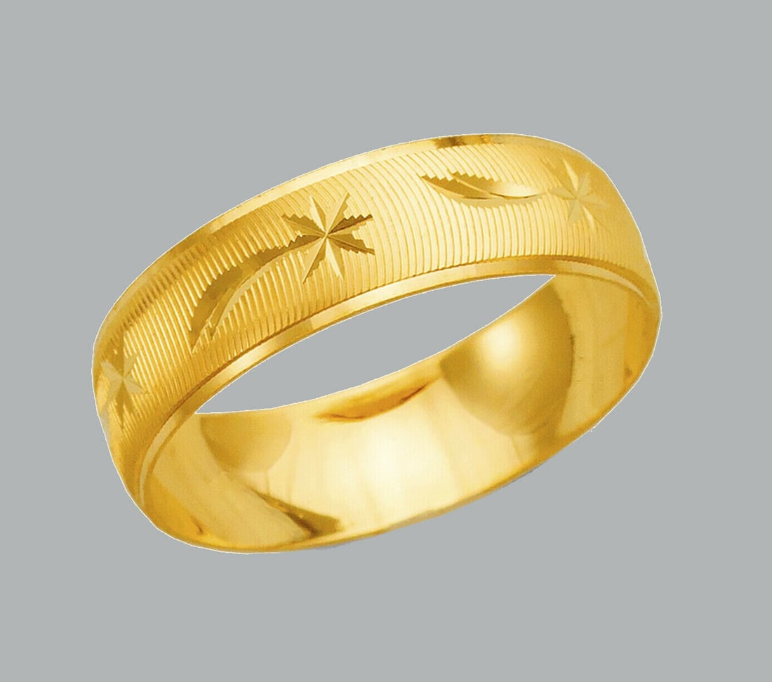 14K SOLID YELLOW GOLD STAR WEDDING BAND RING 6mm SIZE 6: NEW 14K YELLOW GOLD WEDDING BAND RING Band is 6mm wide Size 6 14K Solid Yellow gold (not hollow or plated) shooting star design around the band Polished finish Ring is New Stamped 14K Avg weight is 2g
