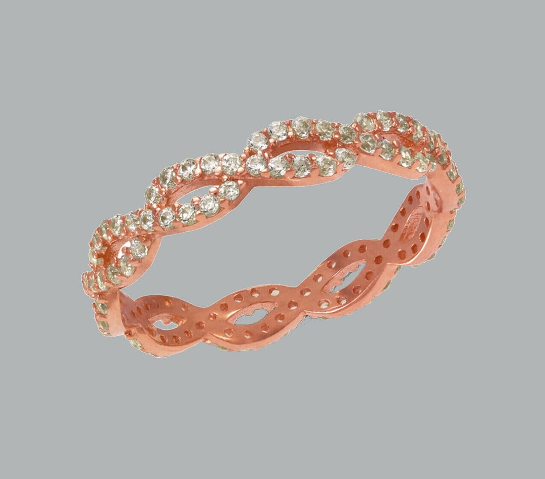14K ROSE GOLD FULL ETERNITY CZ BAND RING SIZE 7: NEW 14K ROSE GOLD ETERNITY BAND New 14K rose gold full eternity band ring 3.5mm Wide Well made rings. prong set with full cut cz. Ring size is 7 Polished finish Apx weight is 1.7g