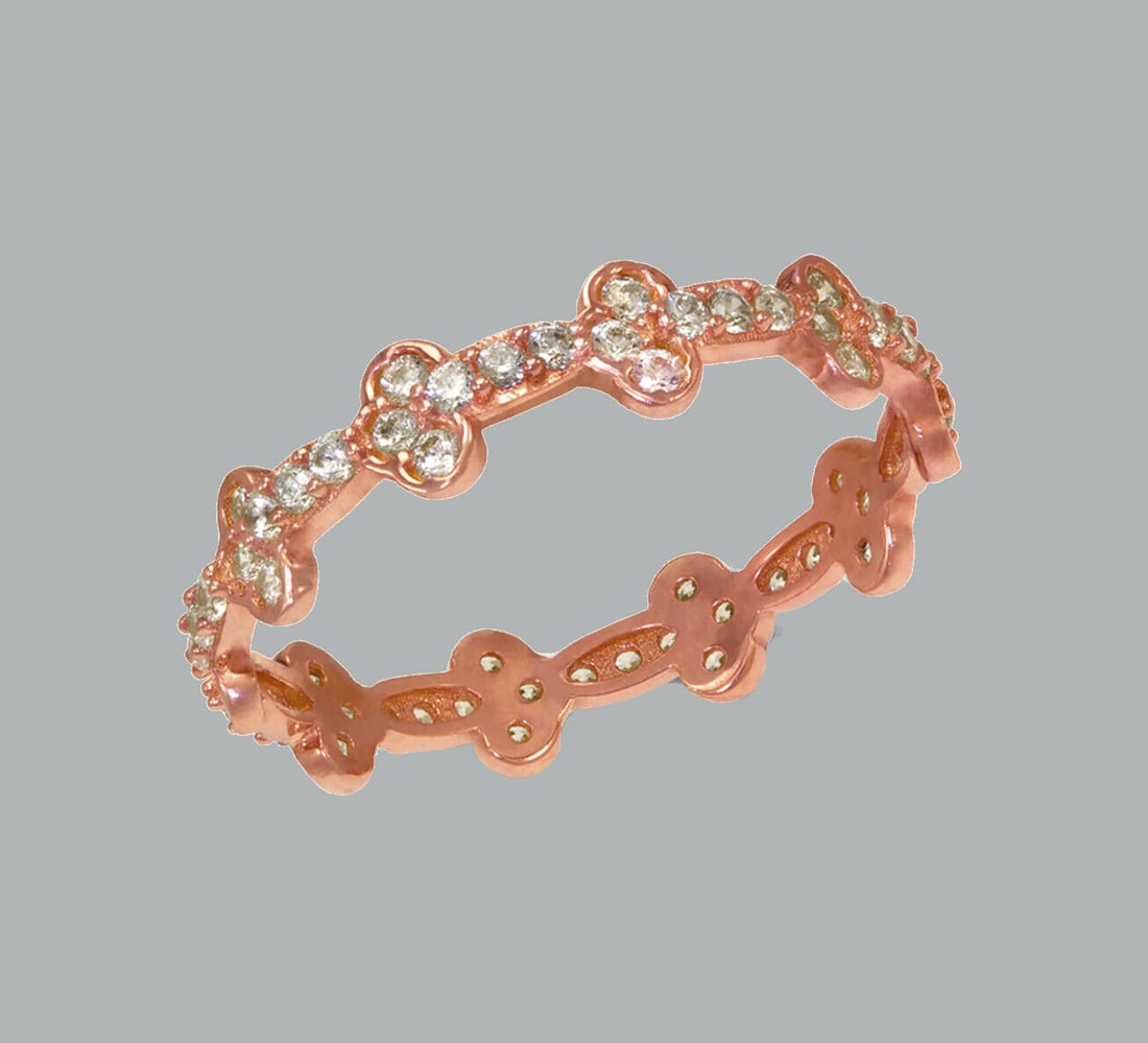 NEW 14K ROSE GOLD FULL ETERNITY CZ BAND RING SIZE 8: NEW 14K ROSE GOLD ETERNITY BAND New 14K rose gold full eternity band ring 4mm Wide Well made rings. prong set with full cut cz. Ring size is 8 Polished finish Apx weight is 1.3g