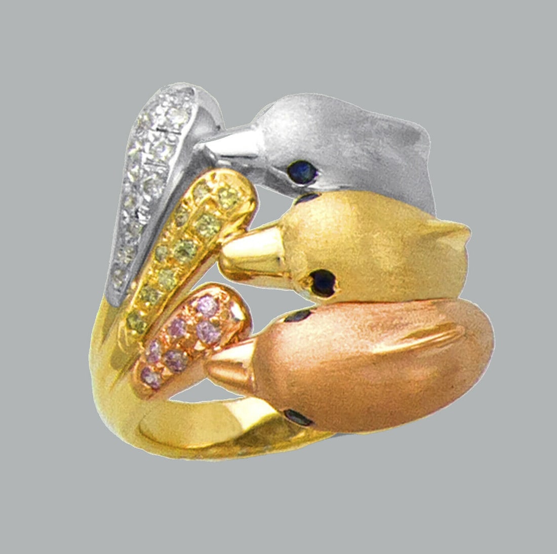 NEW 14K TRI COLOR GOLD LADIES FANCY CZ RING 3 DOLPHINS: NEW 14K TRI COLOR GOLD CZ RING New 14K Tri color solid gold ring Ring size 7 Measures 22mm wide in front Cubic Zirconia Polished Finish Apx Weight: 9g