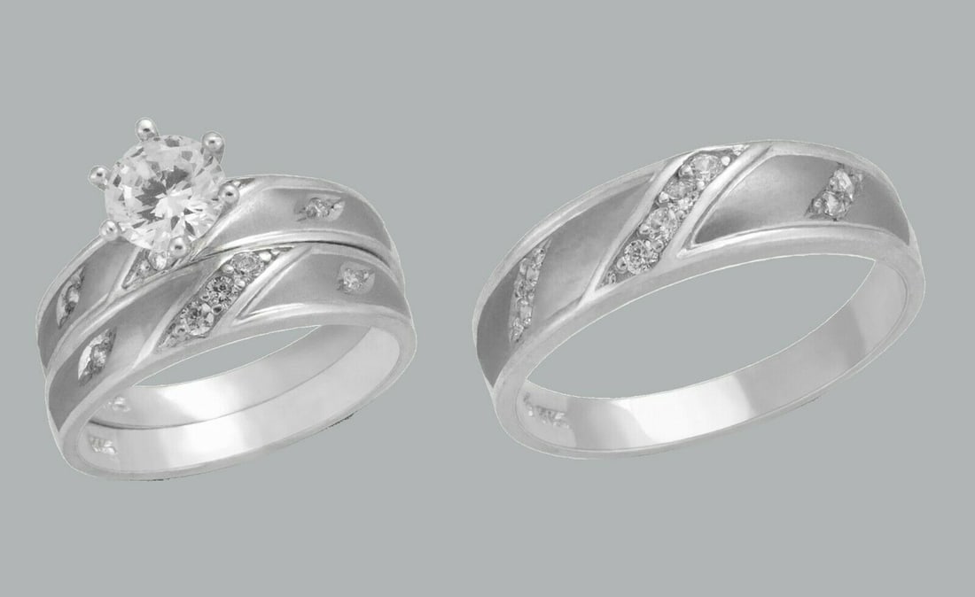14K GOLD TRIO WEDDING SET CZ ENGAGEMENT RING BANDS 3pcs: NEW 14K WHITE GOLD WEDDING SET New 14K White solid gold wedding rings set 3 rings total (can easily be resized by your local jeweler) 2 Ladies Rings Size - 7 1 Mens Ring Size 10 Polished Finish Apx We