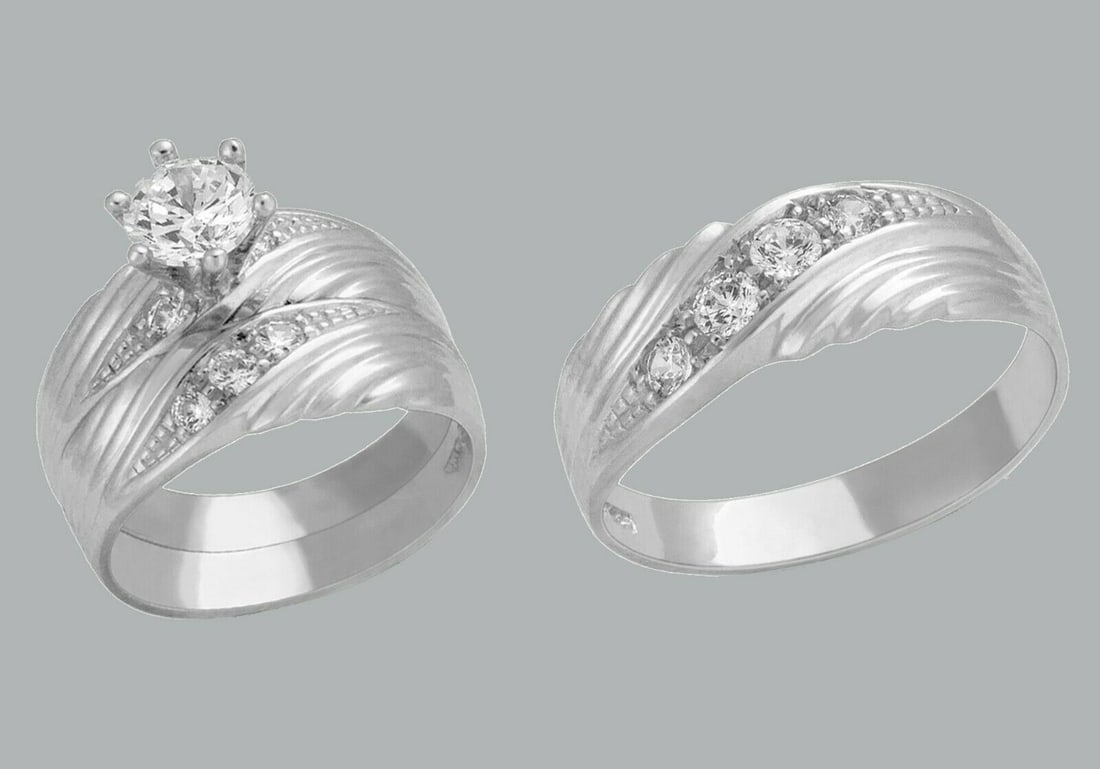 14K GOLD TRIO WEDDING SET CZ ENGAGEMENT RING BANDS 3pcs: NEW 14K WHITE GOLD WEDDING SET New 14K White solid gold wedding rings set 3 rings total (can easily be resized by your local jeweler) 2 Ladies Rings Size - 7 1 Mens Ring Size - 10 Polished finish Apx