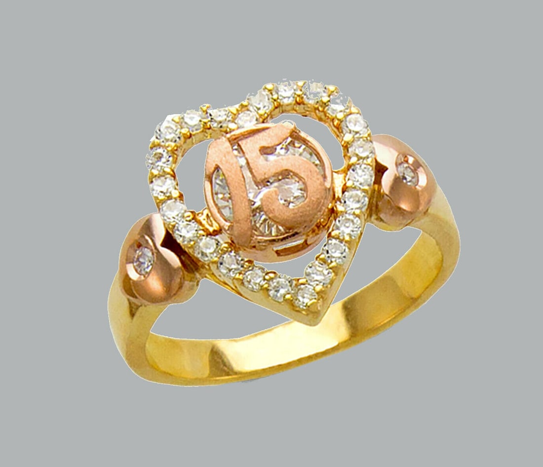 14K TWO TONE GOLD LADIES FANCY CZ HEART RING 15 ANOS: NEW 14K TWO TONE GOLD CZ 15 ANOS HEART RING New 14K Two tone solid gold ring Ring size 7 Measures 14mm wide in front Cubic Zirconia Polished Finish Apx Weight: 4.5g