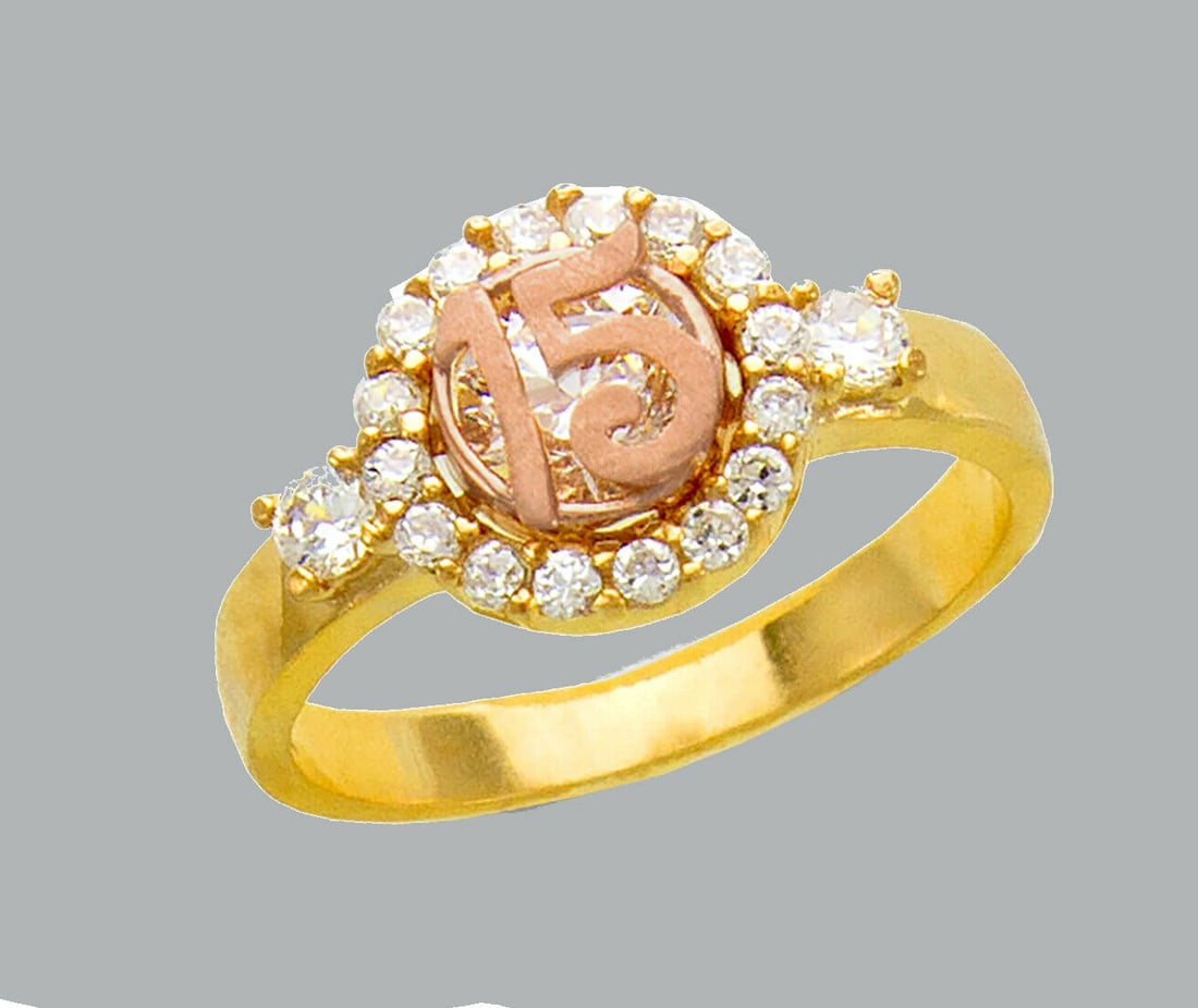 NEW 14K TWO TONE GOLD LADIES FANCY CZ RING 15 ANOS: NEW 14K TWO TONE GOLD CZ 15 ANOS RING New 14K Two tone solid gold ring Ring size 7 Measures 10mm wide in front Cubic Zirconia Polished Finish Apx Weight: 3.5g