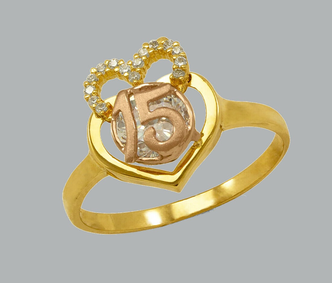 14K TWO TONE GOLD LADIES FANCY CZ HEART RING 15 ANOS: NEW 14K TWO TONE GOLD CZ 15 ANOS HEART RING New 14K Two tone solid gold ring Ring size 7 Measures 11mm W x 12mm H on top Cubic Zirconia Polished / satin Finish Apx Weight: 2g