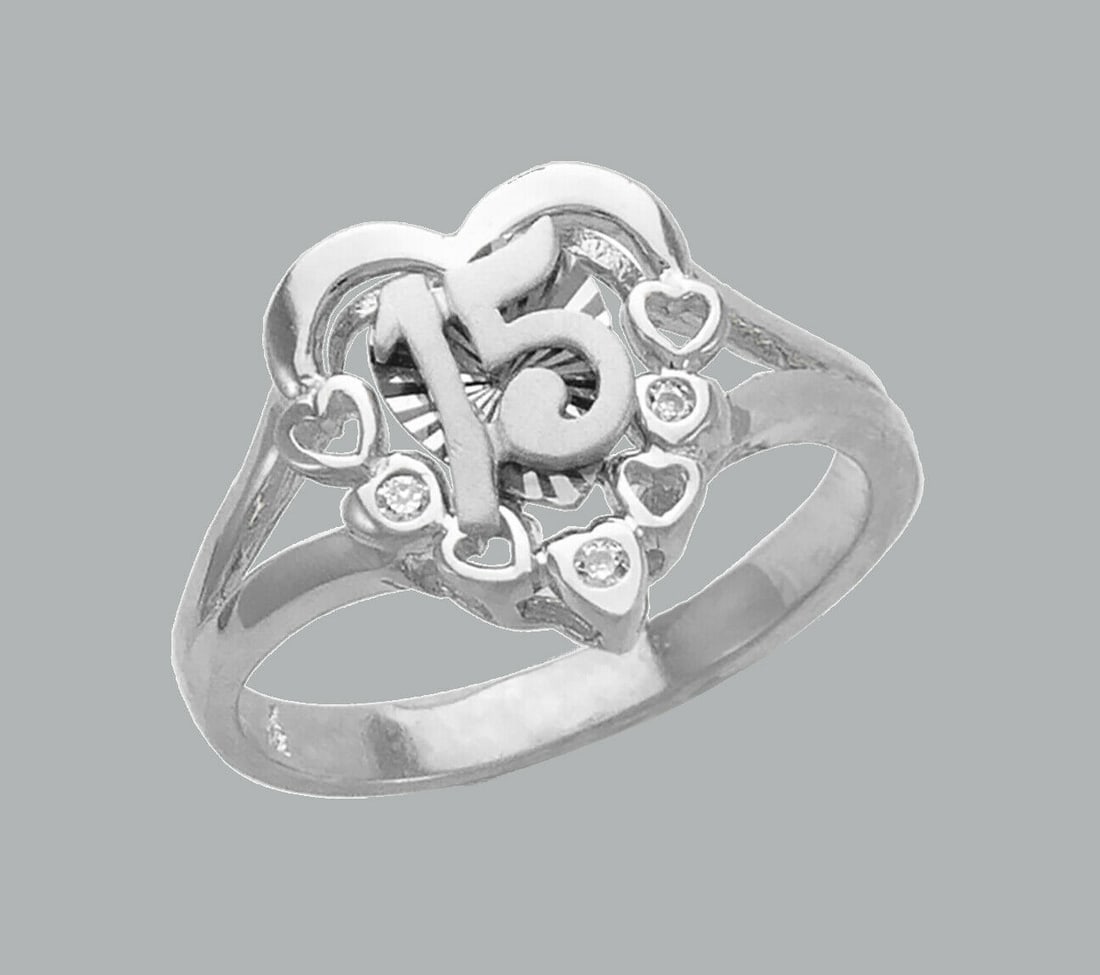 NEW 14K WHITE GOLD LADIES FANCY CZ HEART RING 15 ANOS: NEW 14K WHITE GOLD CZ 15 ANOS HEART RING New 14K White solid gold ring Ring size 7 Measures 13mm on top Cubic Zirconia Polished / satin Finish Apx Weight: 3.7g