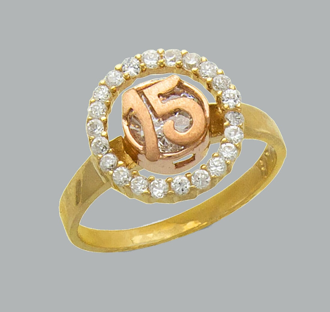 NEW 14K TWO TONE GOLD LADIES FANCY CZ RING 15 ANOS: NEW 14K TWO TONE GOLD CZ 15 ANOS RING New 14K Two tone solid gold ring Ring size 7 Measures 12mm wide in front Cubic Zirconia Polished Finish Apx Weight: 3.2g