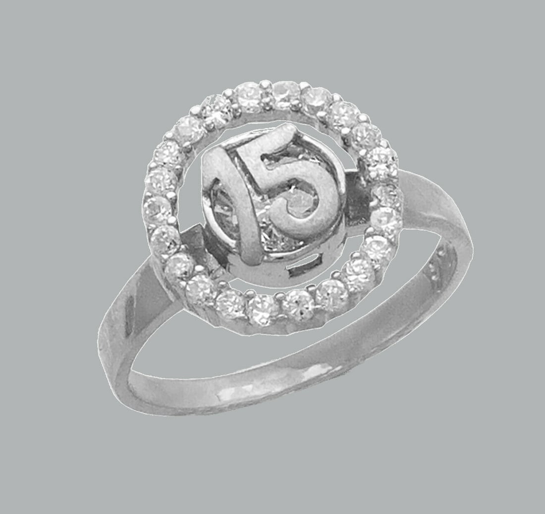 NEW 14K WHITE GOLD LADIES FANCY CZ RING 15 ANOS: NEW 14K WHITE GOLD CZ 15 ANOS RING New 14K White solid gold ring Ring size 7 Measures 12mm wide in front Cubic Zirconia Polished Finish Apx Weight: 3.2g