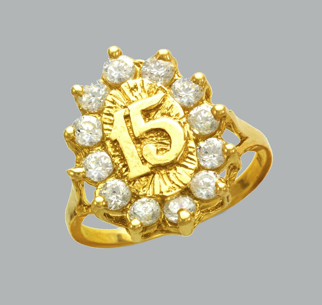NEW 14K YELLOW GOLD LADIES CLEAR CZ RING 15 ANOS: NEW 14K YELLOW GOLD CZ 15 ANOS RING New 14K Yellow solid gold ring Ring size 7 Measures 20mm wide Cubic Zirconia Polished Finish Apx Weight: 4.8g