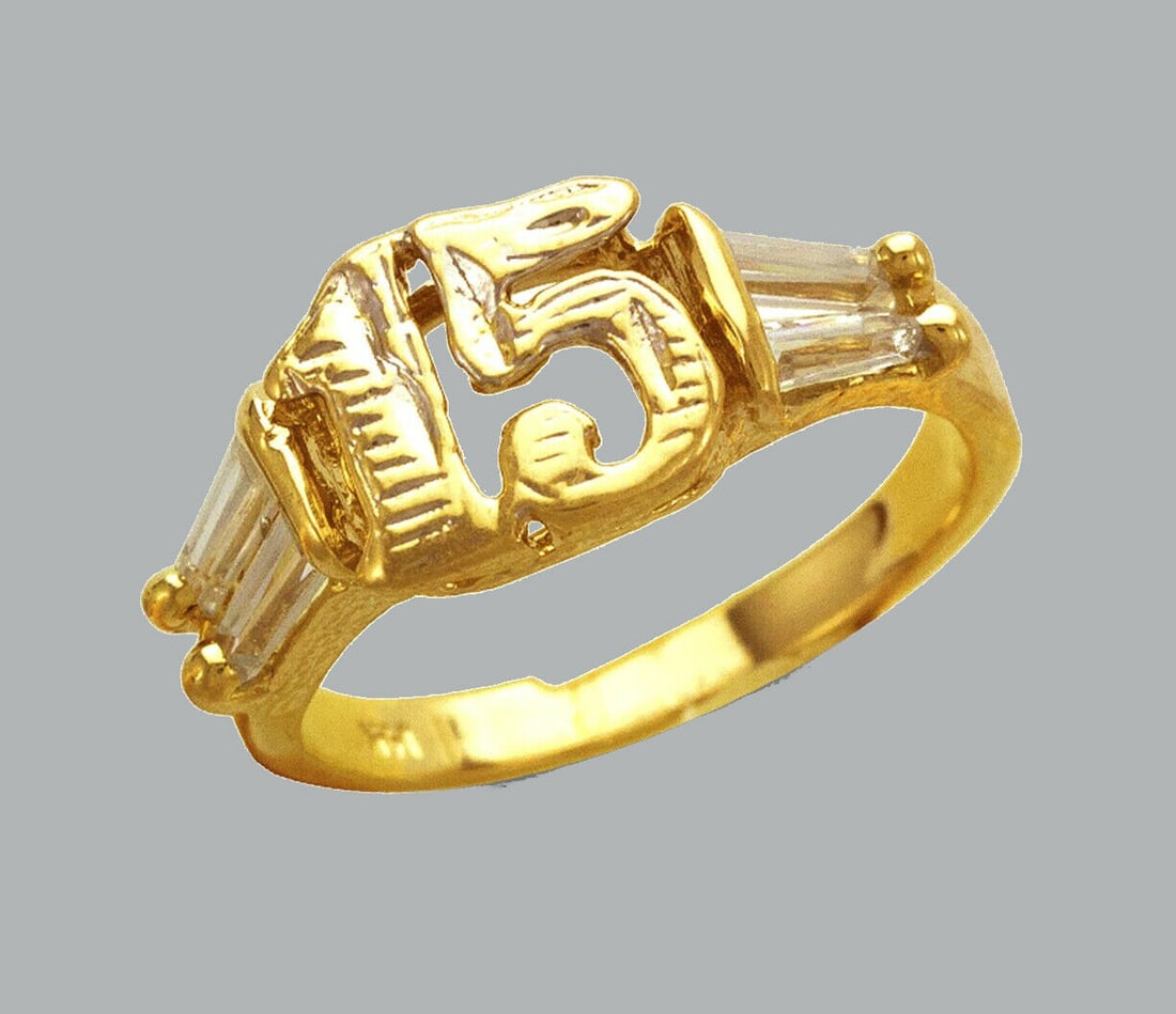 NEW 14K YELLOW GOLD LADIES CLEAR CZ RING 15 ANOS: NEW 14K YELLOW GOLD CZ 15 ANOS RING New 14K Yellow solid gold ring Ring size 7 Measures 9mm wide Cubic Zirconia Polished Finish Apx Weight: 3.1g