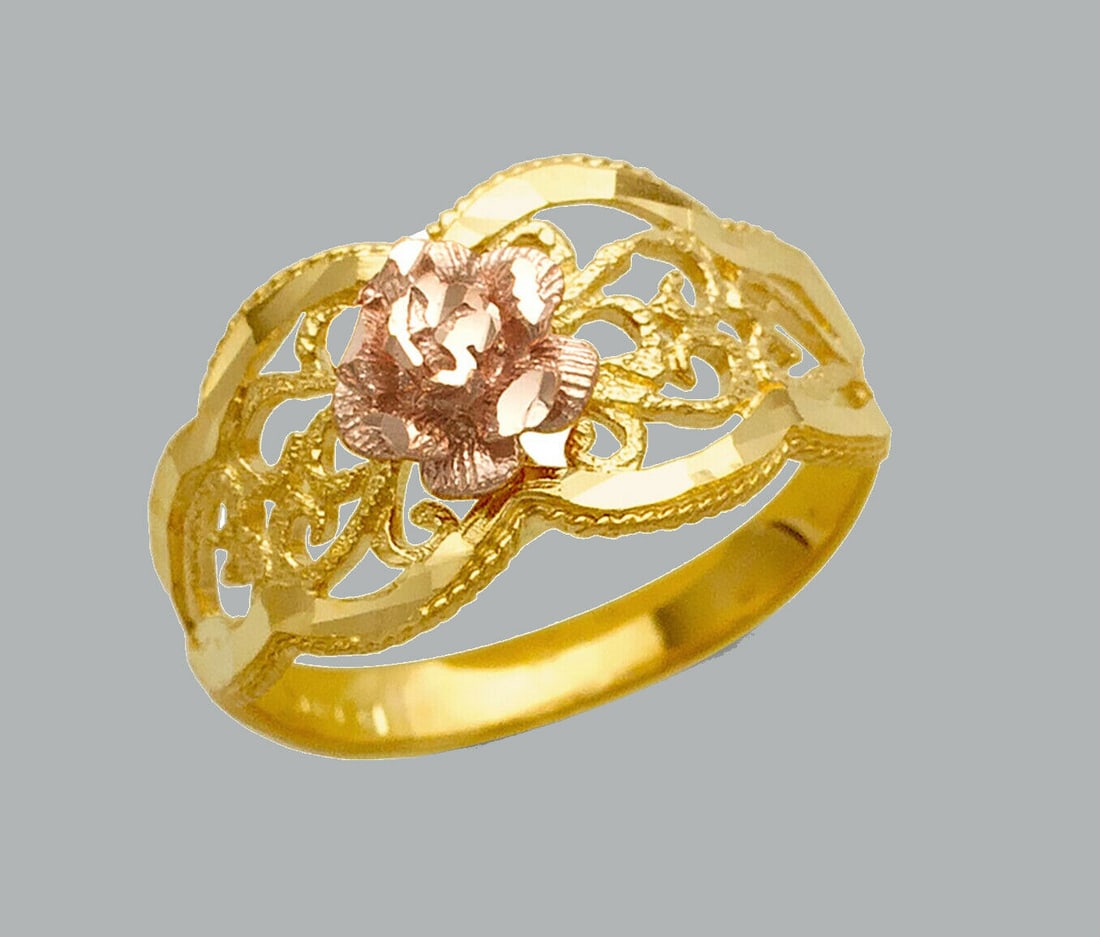 NEW 14K TWO TONE GOLD LADIES FANCY RING FLOWER: NEW 14K TWO TONE GOLD RING New 14K Two tone solid gold ring Ring size 7 Measures 10mm wide in front Diamond cut Polished Finish Apx Weight: 2g