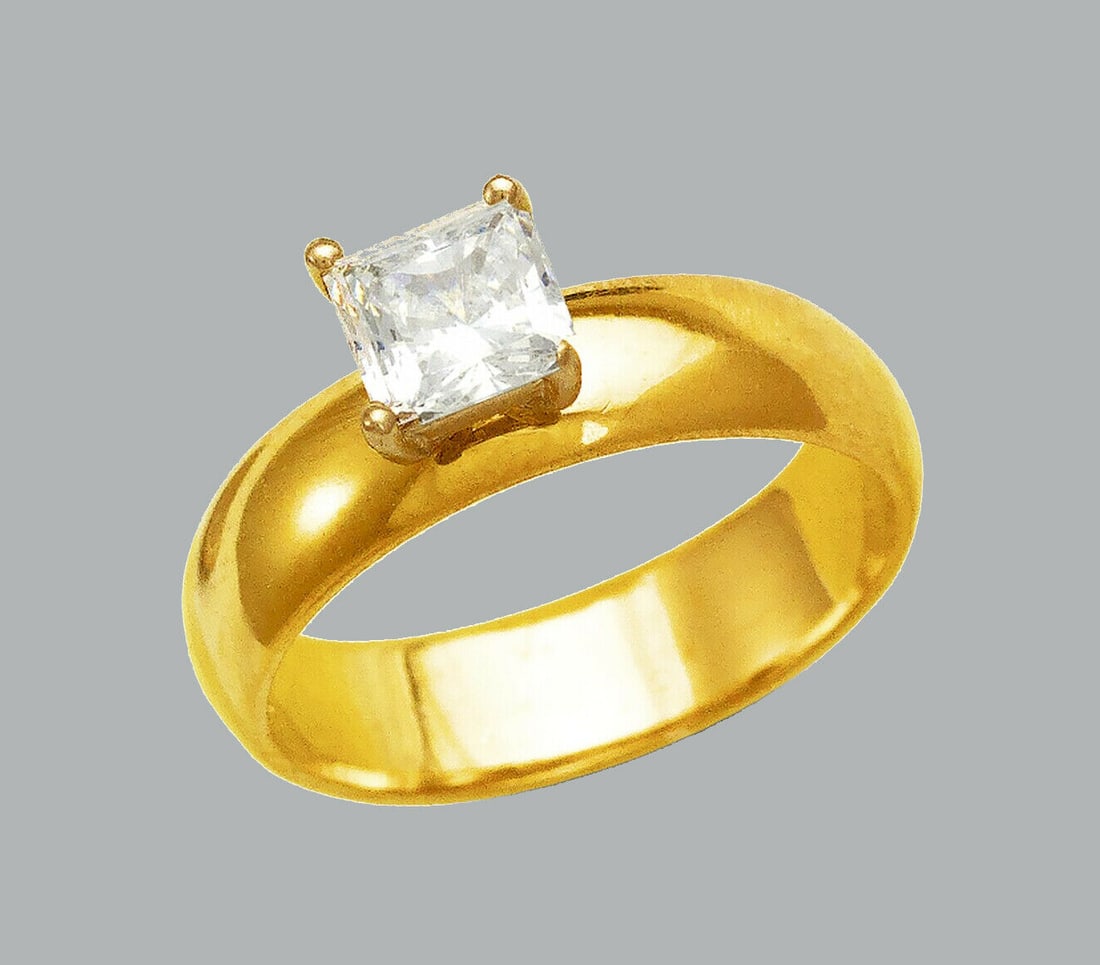 14K Y/ GOLD CZ RING PRINCESS CUT ENGAGEMENT SOLITAIRE: NEW 14K YELLOW GOLD CZ RING New 14K Yellow solid gold ring Ring size 7 Measures 5mm band Cubic Zirconia Polished Finish Apx Weight: 4.1g