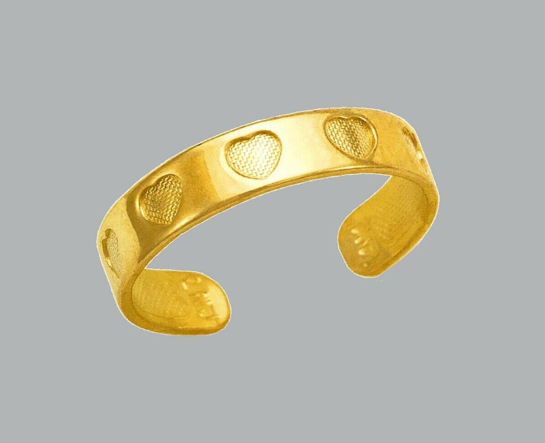 NEW 14K YELLOW GOLD LADIES KNUCKLE TOE RING HEART: NEW 14K YELLOW GOLD TOE RING New 14K Yellow solid gold toe ring Toe ring size is adjustable Measures 4mm wide Polished Finish Apx Weight: 1g