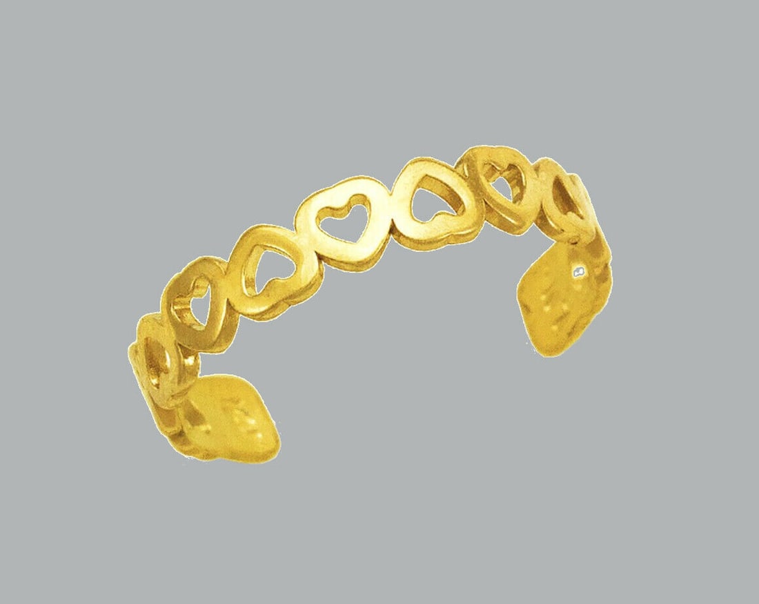 NEW 14K YELLOW GOLD LADIES KNUCKLE TOE RING HEART: NEW 14K YELLOW GOLD TOE RING New 14K Yellow solid gold toe ring Toe ring size is adjustable Measures 4mm wide Polished Finish Apx Weight: 0.8g