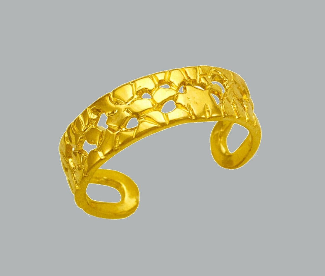 NEW 14K YELLOW GOLD LADIES KNUCKLE TOE RING NUGGET: NEW 14K YELLOW GOLD TOE RING New 14K Yellow solid gold toe ring Toe ring size is adjustable Measures 5mm wide Polished Finish Apx Weight: 1.4g