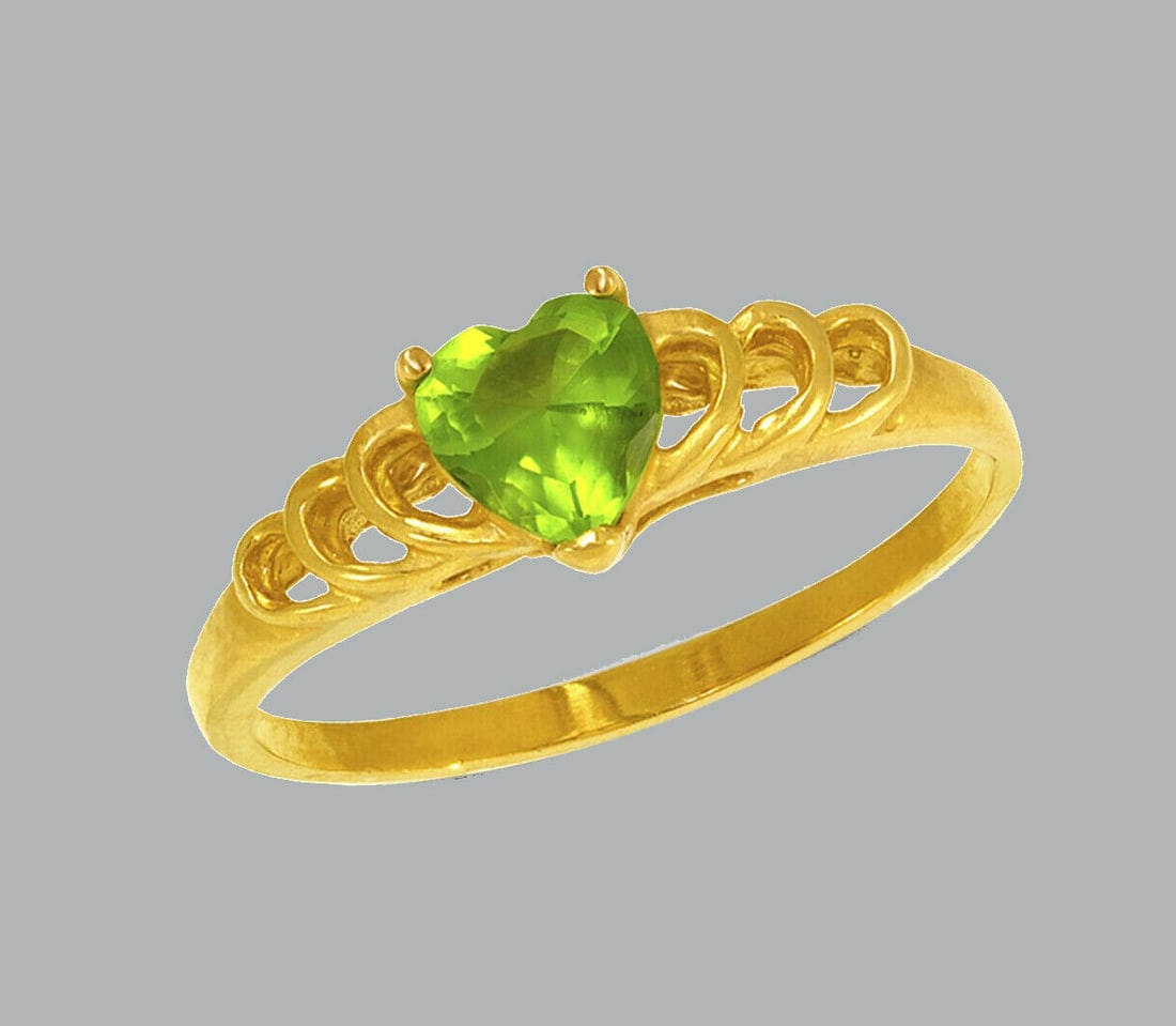 NEW 14K YELLOW GOLD LADIES FANCY CZ RING GREEN HEART: NEW 14K YELLOW GOLD CZ RING New 14K Yellow solid gold ring Ring size 7 Measures 5mm wide on top Cubic Zirconia Polished Finish Apx Weight: 1.4g