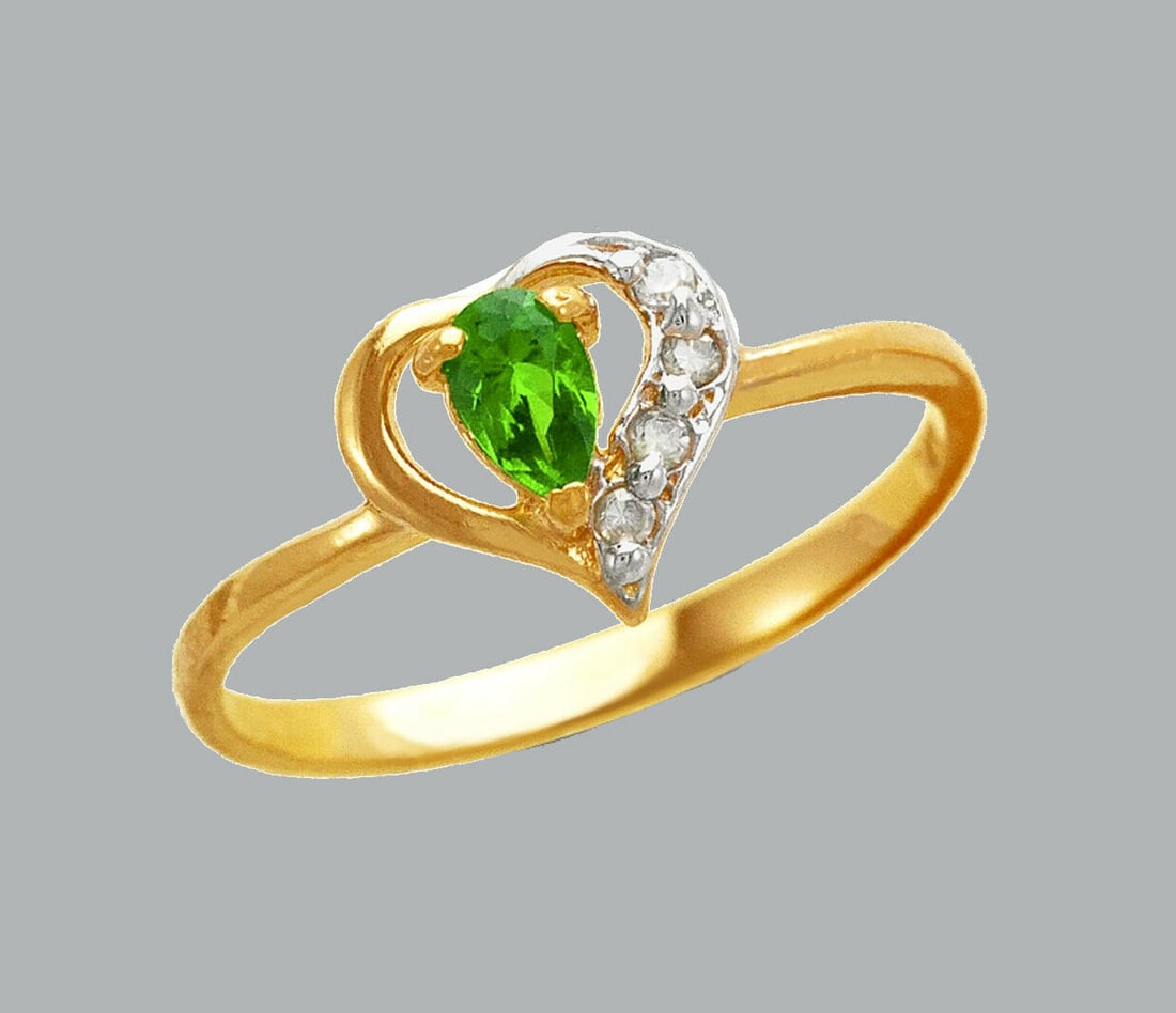 14K TWO TONE GOLD LADIES FANCY CZ RING GREEN HEART: NEW 14K TWO TONE GOLD CZ RING New 14K Two tone solid gold ring Ring size 7 Measures 8mm wide on top Cubic Zirconia Polished Finish Apx Weight: 1.4g