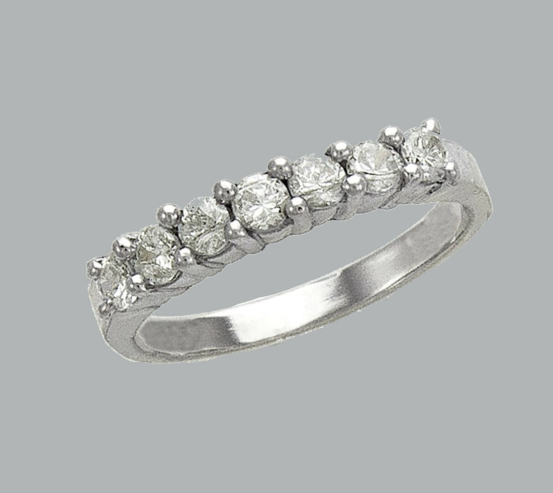 NEW 14K WHITE GOLD LADIES CZ FANCY BAND RING: NEW 14K WHITE GOLD CZ RING New 14K White solid gold ring Ring size 7 3mm Band Cubic Zirconia Polished Finish Apx Weight: 2.6g