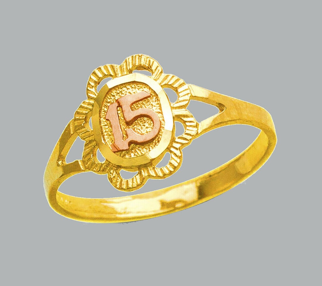 NEW 14K TWO TONE GOLD LADIES FANCY RING 15 ANOS FLOWER: NEW 14K TWO TONE GOLD RING New 14K Two tone solid gold ring Ring size 7 Measures 11mm wide in front Polished Finish Apx Weight: 1.3g