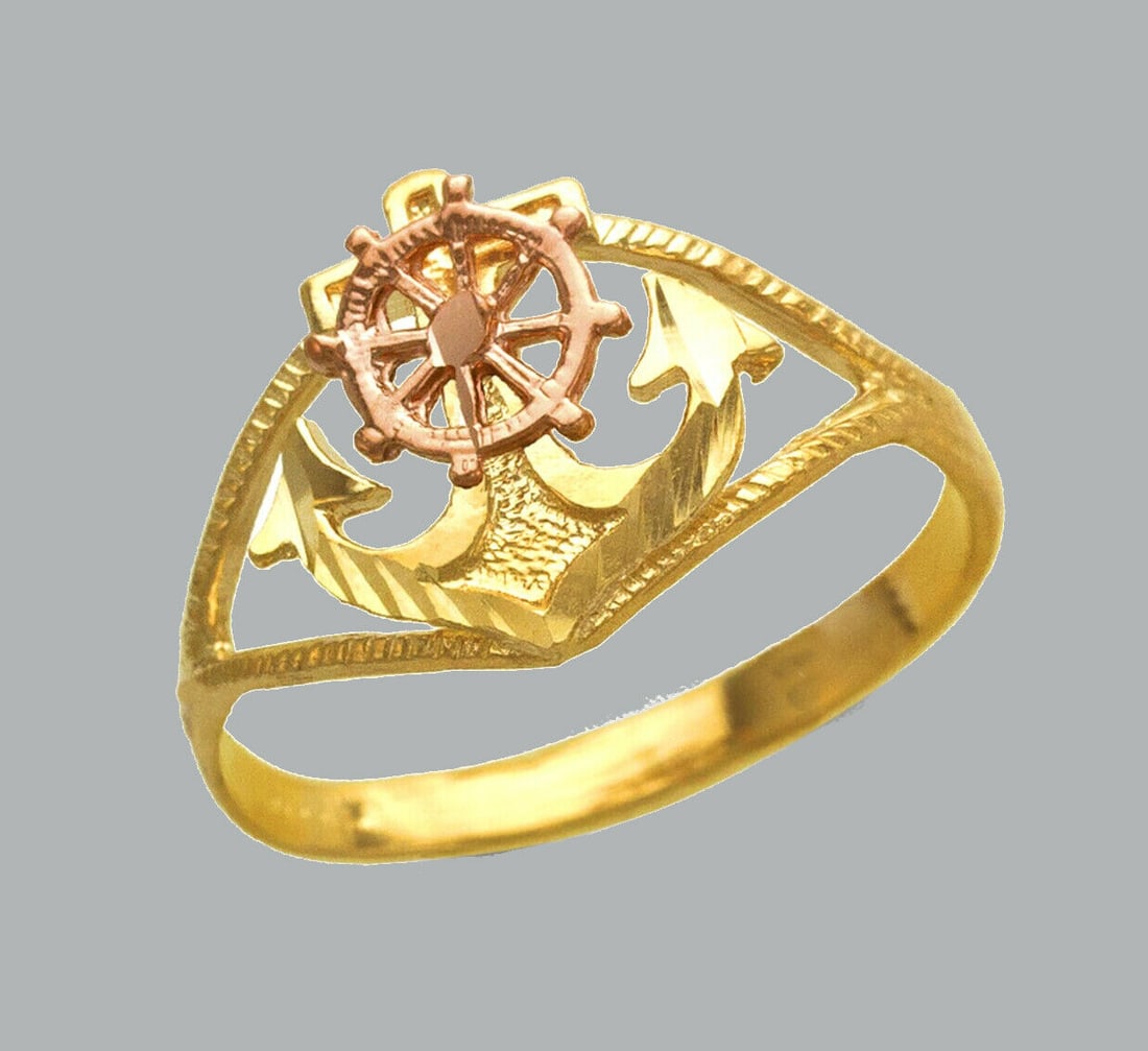 NEW 14K TWO TONE GOLD LADIES FANCY RING ANCHOR: NEW 14K TWO TONE GOLD RING New 14K Two tone solid gold ring Ring size 7 Measures 12mm wide in front Diamond cut Polished Finish Apx Weight: 2g
