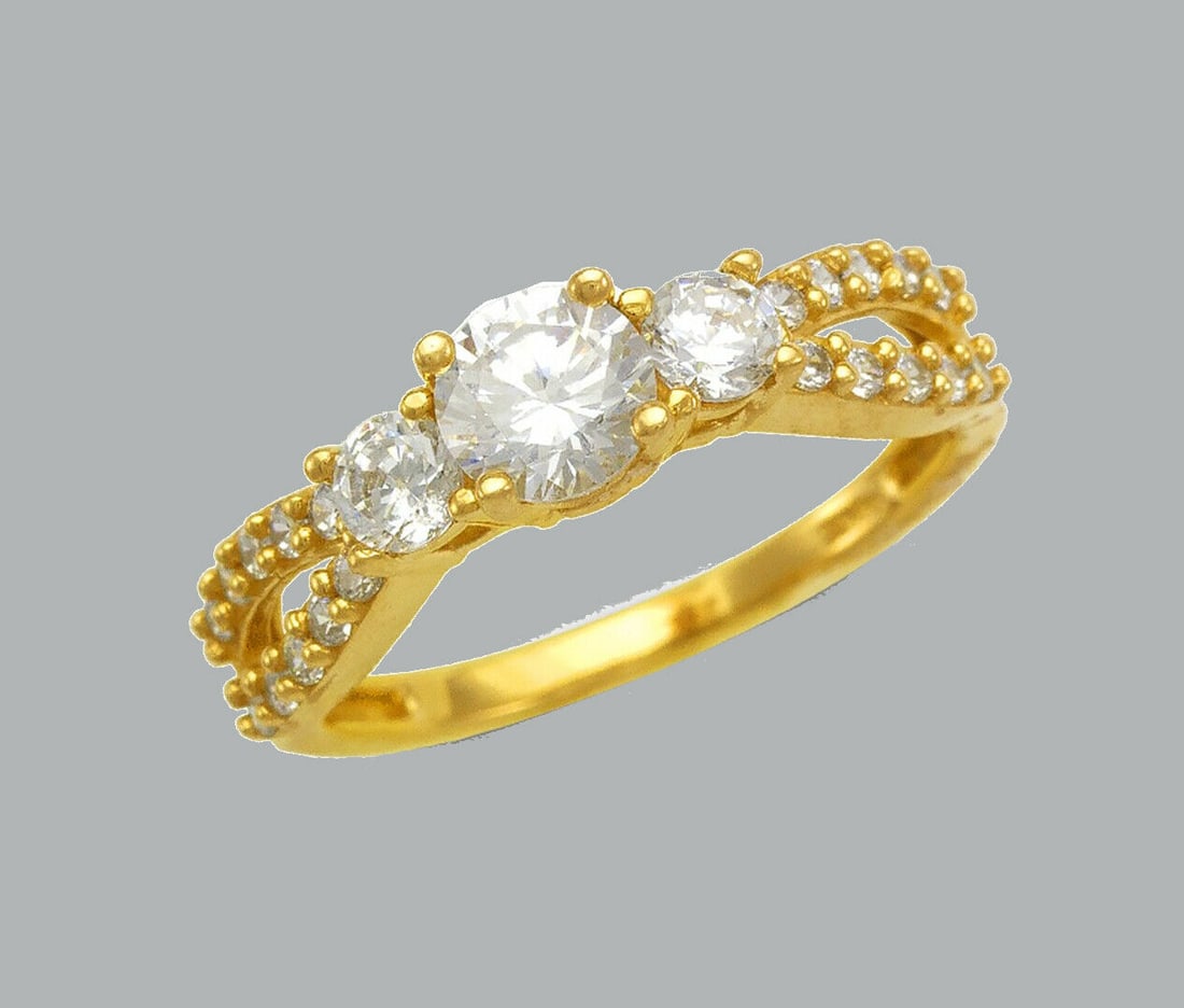 14K YELLOW GOLD LADIES ENGAGEMENT RING SPLIT SHANK: NEW 14K YELLOW GOLD CZ RING New 14K Yellow solid gold ring Ring size 7 Measures 5mm wide Cubic Zirconia Polished Finish Apx Weight: 3g