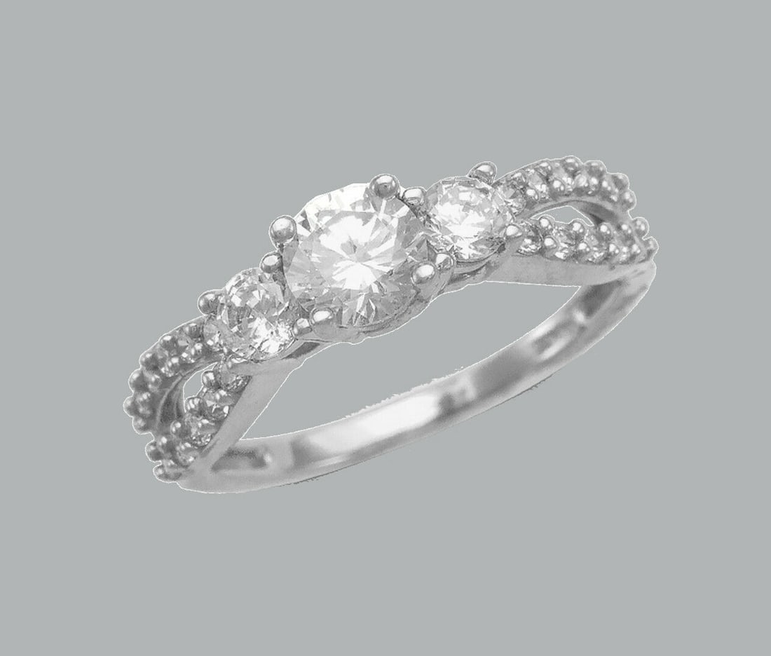 14K WHITE GOLD LADIES ENGAGEMENT RING SPLIT SHANK: NEW 14K WHITE GOLD CZ RING New 14K White solid gold ring Ring size 7 Measures 5mm wide Cubic Zirconia Polished Finish Apx Weight: 3.2g