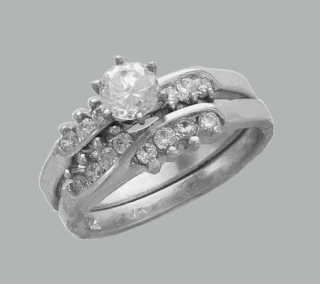 14K WHITE GOLD LADIES CZ ENGAGEMENT RING MATCHING BAND: NEW 14K WHITE GOLD CZ RINGSNew 14K White solid gold rings2 RingsRing size 7Measures, 4mm wide bandCubic Zirconia Polished Finish Apx Weight: 5g