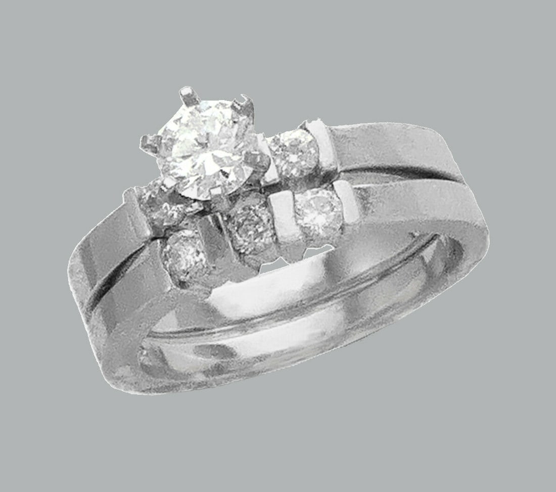 14K WHITE GOLD LADIES CZ ENGAGEMENT RING MATCHING BAND: NEW 14K WHITE GOLD CZ RINGSNew 14K White solid gold rings2 RingsRing size 7Measures, 3mm wide bandCubic Zirconia Polished Finish Apx Weight: 8g