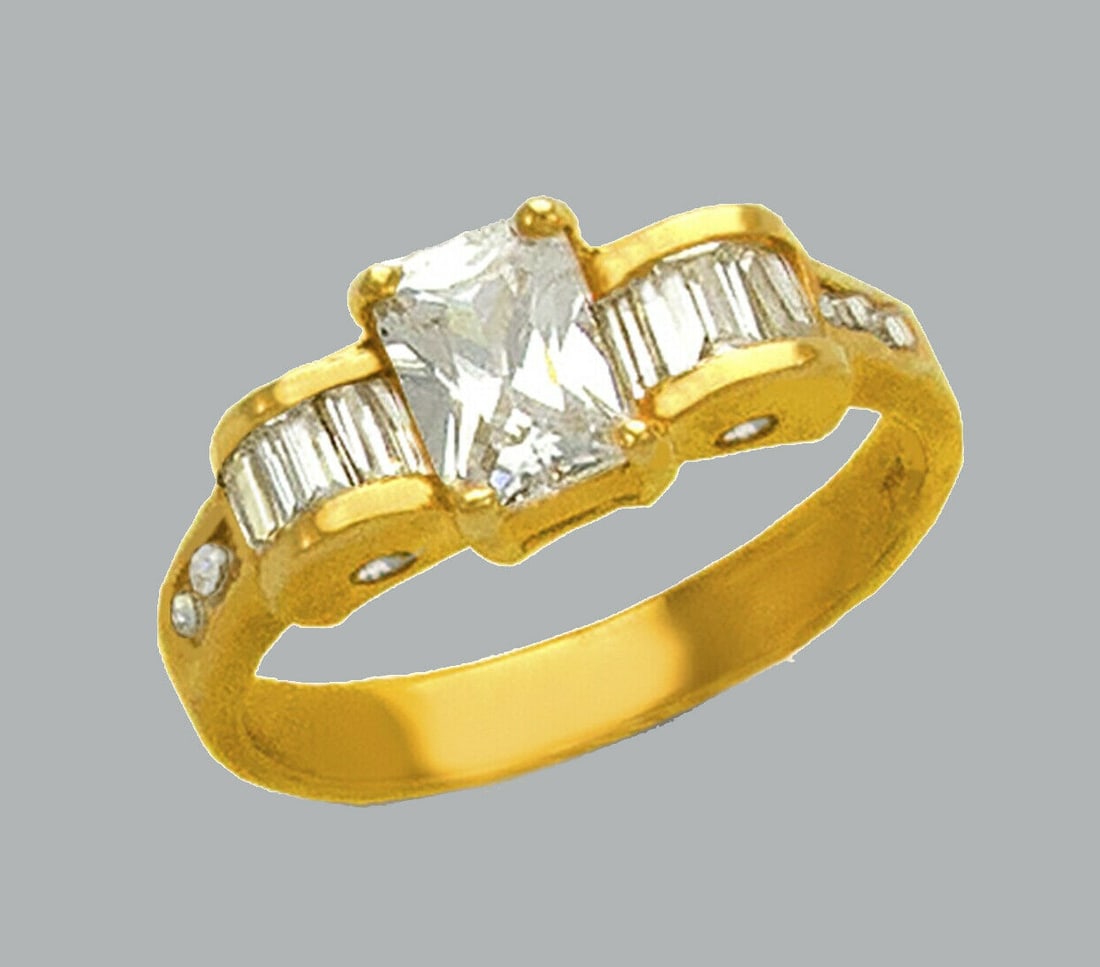 14K YELLOW GOLD LADIES FANCY ENGAGEMENT RING EMERALD: NEW 14K YELLOW GOLD CZ RINGNew 14K Yellow solid gold ringRing size 7Measures 7mm wide on topCubic Zirconia Polished FinishApx Weight: 4.2g