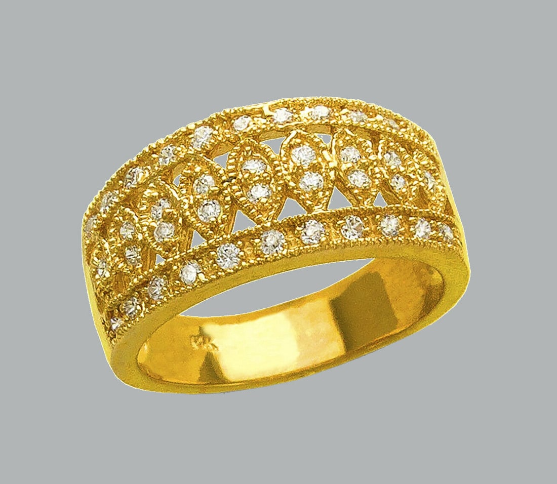 NEW 14K YELLOW GOLD LADIES FANCY CZ RING FILIGREE BAND: NEW 14K YELLOW GOLD CZ RINGNew 14K Yellow solid gold ringRing size 7Measures 10mm wide on topCubic Zirconia Polished FinishApx Weight: 5.7g