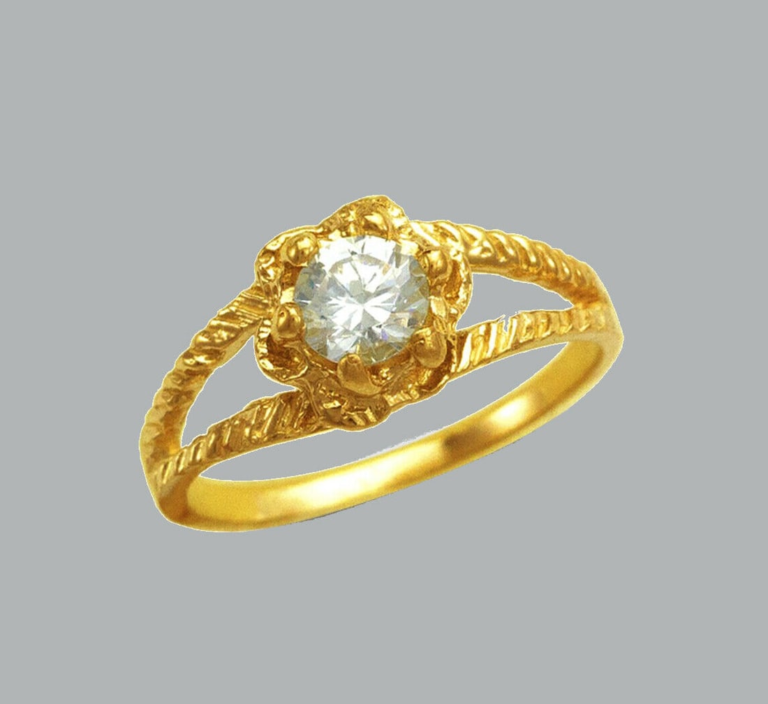 NEW 14K YELLOW GOLD CZ KIDS GIRLS RING SOLITAIRE FLOWER: NEW 14K GOLD KIDS CZ RING New 14K Yellow solid gold ring Small (baby) ring size Ring measures 7mm wide on top Cubic Zirconia Polished Finish Apx Weight: 1.4g