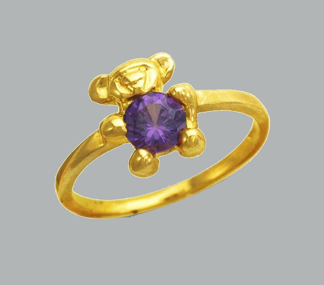 NEW 14K YELLOW GOLD CZ KIDS CHILD RING BEAR: NEW 14K GOLD KIDS CZ RING New 14K Yellow solid gold ring Small (baby) ring size Ring measures 8mm wide on top Cubic Zirconia Polished Finish Apx Weight: 1g