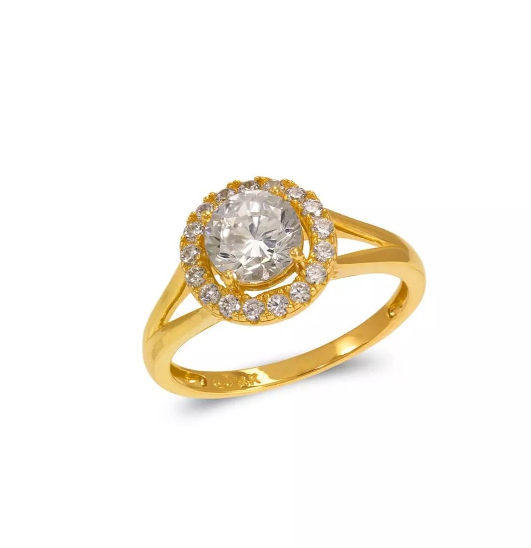 NEW 14K YELLOW GOLD LADIES FANCY SOLITAIRE HALO CZ RING: NEW 14K YELLOW GOLD LADIES FANCY SOLITAIRE HALO CZ RING 14K Yellow Gold Size 7 Approx. 6mm Stone, 10mm Center, 2mm Band High Polished/Cubic Zirconia Available in White Gold Weight: 3.2 Grams