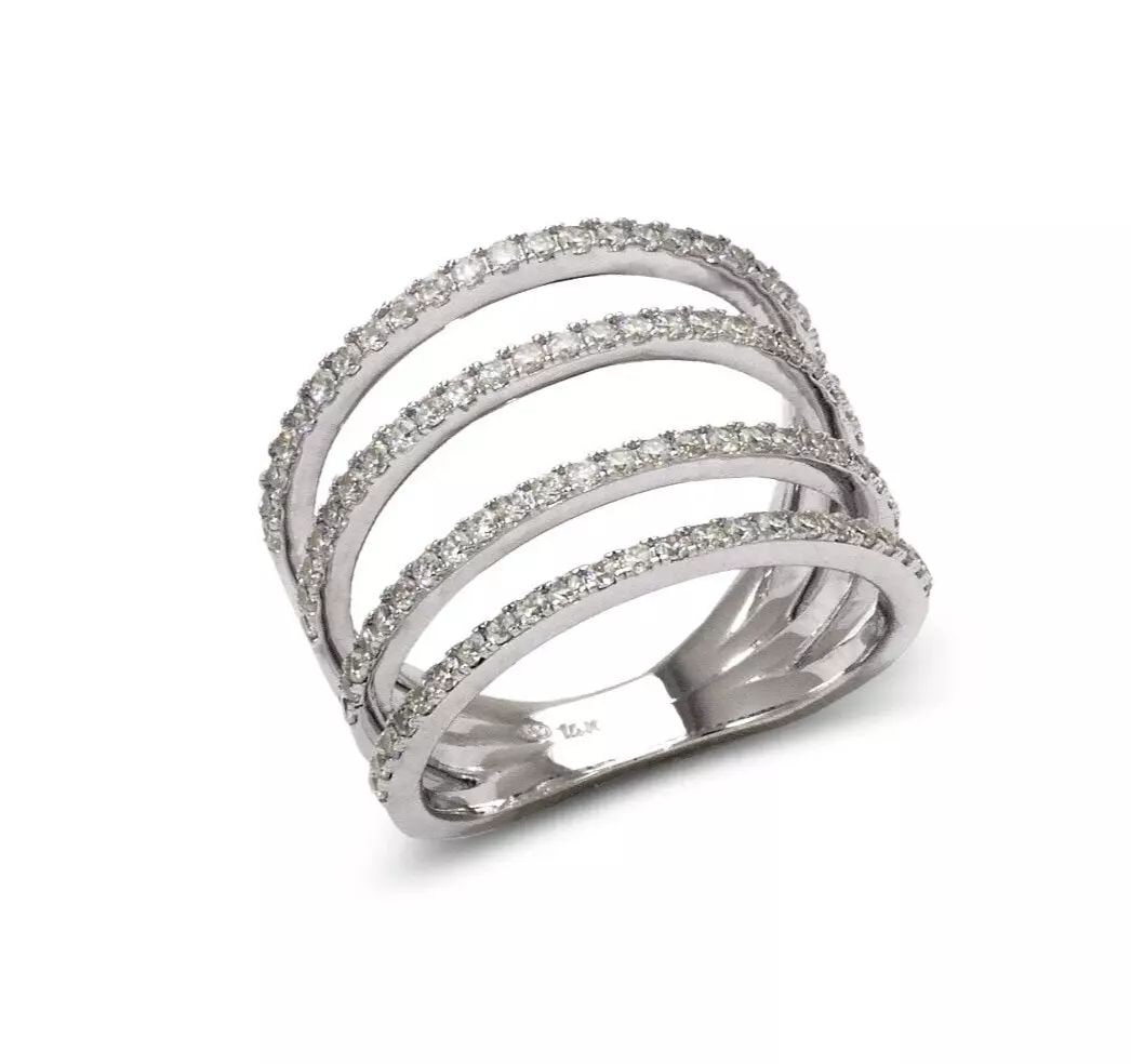 NEW 14K WHITE GOLD LADIES FANCY CZ RING: NEW 14K WHITE GOLD LADIES FANCY CZ RING 14K White Gold Size 7 Approx. 15mm High Polished/Cubic Zirconia Available in Yellow Gold Weight: 6.2 Grams