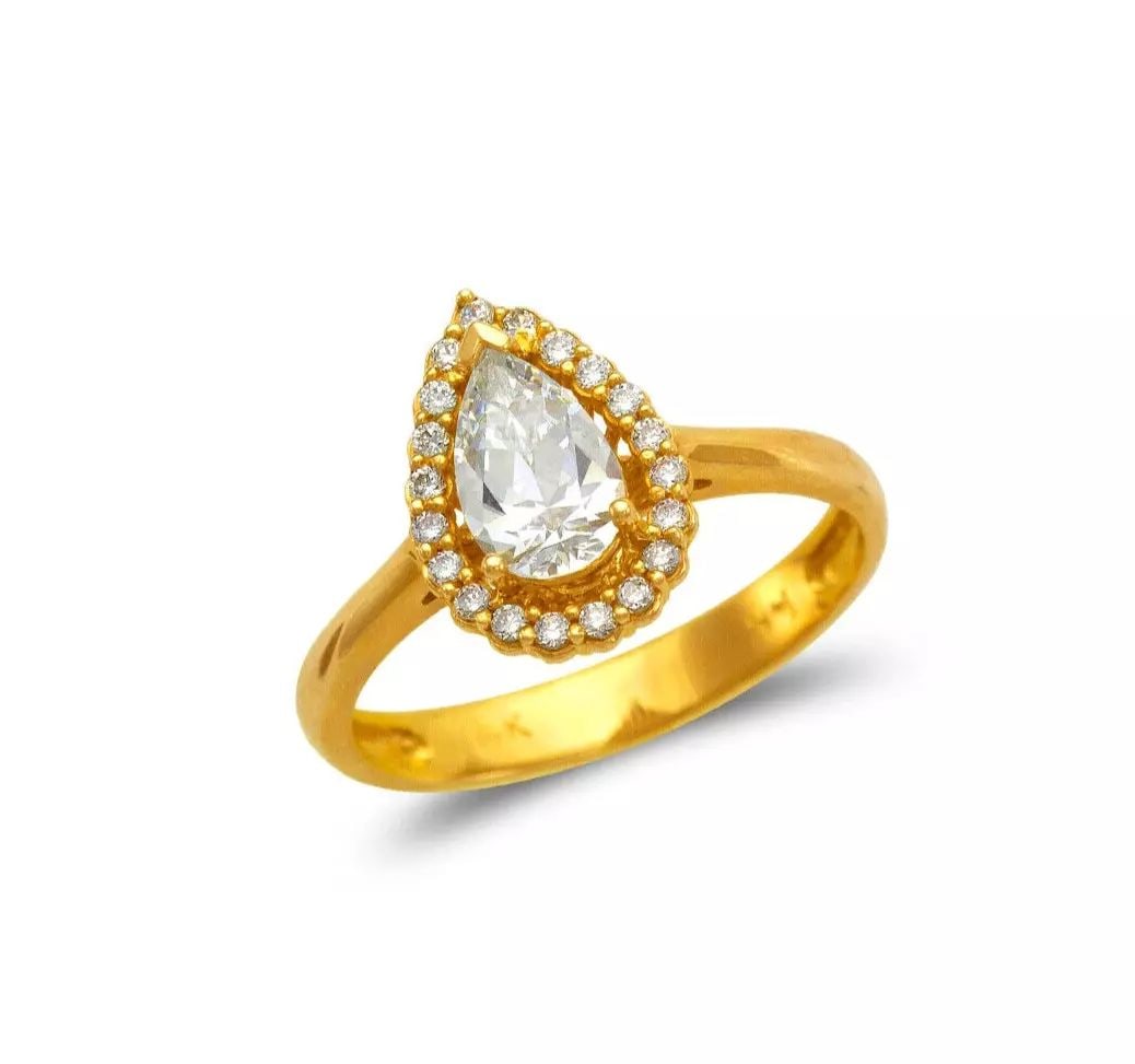 NEW 14K YELLOW GOLD LADIES FANCY TEARDROP SOLITAIRE CZ RING: NEW 14K YELLOW GOLD LADIES FANCY TEARDROP SOLITAIRE CZ RING 14K Yellow Gold Size 7 Approx. 12mm High Polished/Cubic Zirconia Available in White Gold Weight: 2.9 Grams