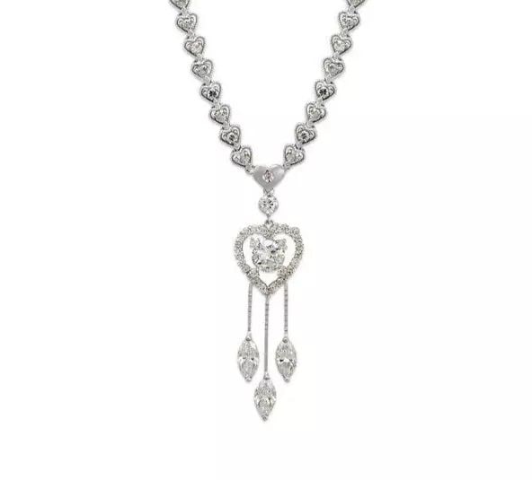 NEW 14K WHITE GOLD FANCY HEART CZ NECKLACE: NEW 14K WHITE GOLD FANCY HEART CZ NECKLACE 14K White Gold Approx. 5mm Wide, 13x45mm Pendant High Polished/Cubic Zirconia Available in Two Tone Gold Items in this Set: Bracelet, Earrings, Ring Availabl