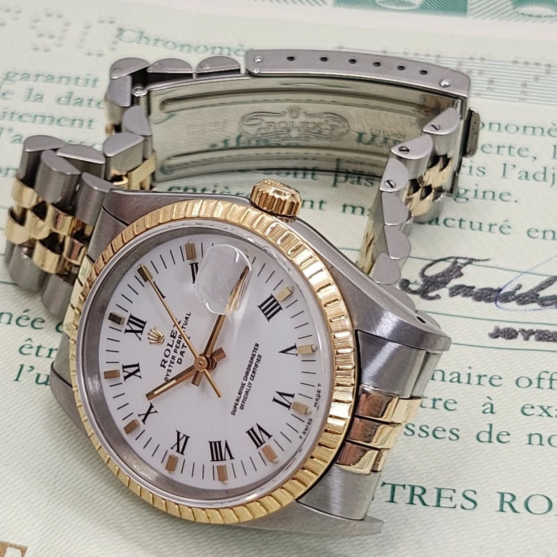W/PAPERS ROLEX DATE 34MM STEEL 18K YELLOW GOLD JUBILEE WATCH 15223 N SERIES 1991: W/PAPERS ROLEX DATE 34MM STEEL 18K YELLOW GOLD JUBILEE WATCH 15223 N SERIES 1991 Condition: Pre-owned - Good: This item has been gently used but is in good condition. It might have a few signs ... Rea