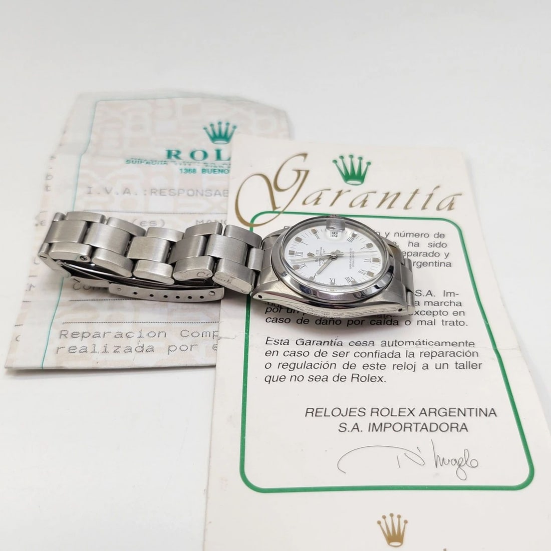 W/SERVICE PAPERS ROLEX DATEJUST 31 MM OYSTER STEEL WHITE ROMAN WATCH 6824 1978: W/SERVICE PAPERS ROLEX DATEJUST 31 MM OYSTER STEEL WHITE ROMAN WATCH 6824 1978 Condition: Pre-owned - Good: This item has been gently used but is in good condition. It might have a few signs ... Read