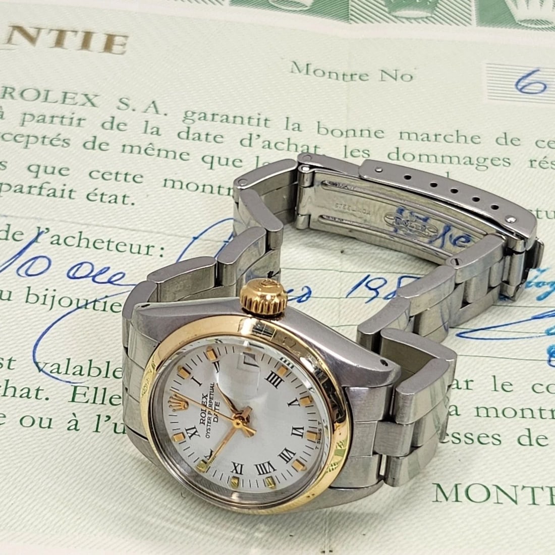 W/PAPERS 1980 ROLEX LADIES DATE 26 MM TWO TONE OYSTER AUTOMATIC WATCH 6916: W/PAPERS 1980 ROLEX LADIES DATE 26 MM TWO TONE OYSTER AUTOMATIC WATCH 6916 Condition: Pre-owned - Good: This item has been gently used but is in good condition. It might have a few signs ... Read more