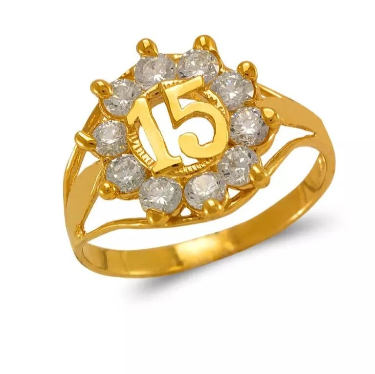 NEW 14K YELLOW GOLD LADIES 15 ANOS CZ RING: NEW 14K YELLOW GOLD LADIES 15 ANOS CZ RING 14K Yellow Gold Size 7 Approx. 9mm Center High Polished/Diamond Cut/Cubic Zirconia Weight: 3.2 Grams