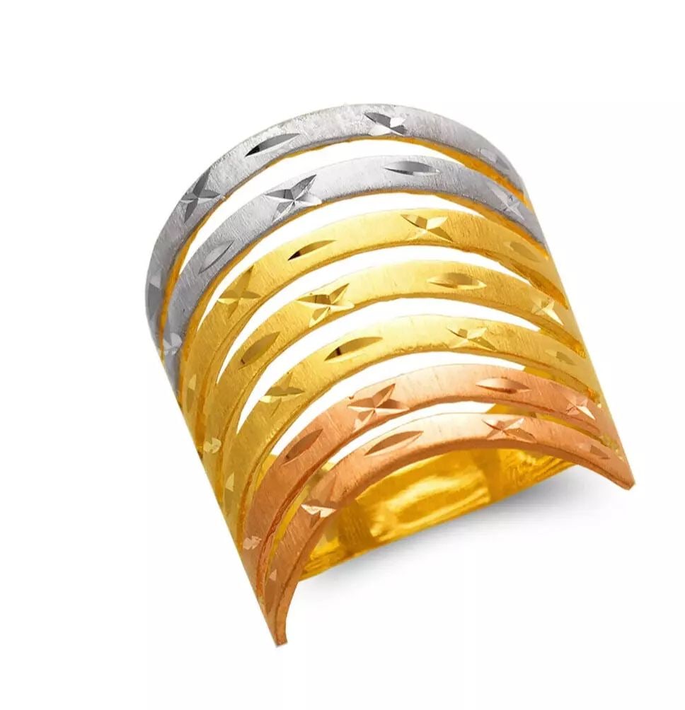 NEW 14K TRI COLOR GOLD LADIES 7 LAYER BAND RING: NEW 14K TRI COLOR GOLD LADIES 7 LAYER BAND RING 14K Tri Color Gold Size 7 Approx. 20mm High Polished/Satin Finished/Diamond Cut Available in Tricolor and White Gold Weight: 6.8 Grams