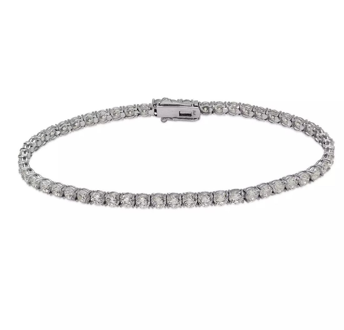 NEW 14K WHITE GOLD ROUND PAVE CZ TENNIS BRACELET 3mm: NEW 14K WHITE GOLD ROUND PAVE CZ TENNIS BRACELET 3mm 14K White Gold Approx. 3mm Stone Cubic Zirconia Available in Yellow Gold Box Clasp Length : 7" Inch Weight: 6.3 Grams
