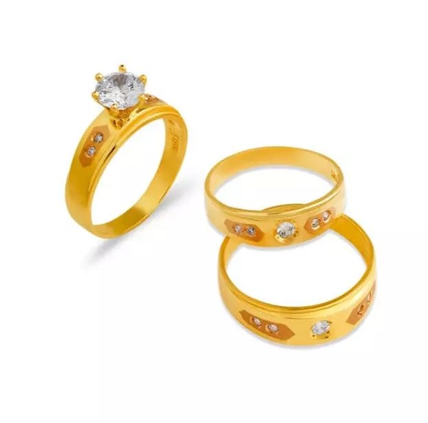 NEW 14K TRI COLOR GOLD WEDDING TRIO RING SET: NEW 14K TRI COLOR GOLD WEDDING TRIO RING SET 14K Tri Color Gold Ladies band and engagement ring is size 7 Men's ring is size 10 Rings Also Sold Separately Available in White Gold Weight: 8.1 Grams