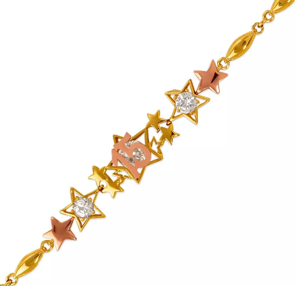 NEW 14K TWO TONE GOLD 15 ANOS STAR CZ BRACELET: NEW 14K TWO TONE GOLD 15 ANOS STAR CZ BRACELET 14K Two Tone Gold Approx. 10mm Center, 3mm Bracelet High Polished/Cubic Zirconia Length : 7" Inch Weight: 7.2 Grams