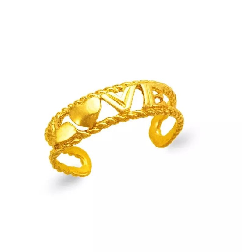 NEW 14K YELLOW GOLD LOVE KNUCKLE / TOE RING: NEW 14K YELLOW GOLD LOVE KNUCKLE / TOE RING 14K Yellow Gold Approx. 5mm Center High Polished/Diamond Cut Adjustable Weight: 1.4 Grams